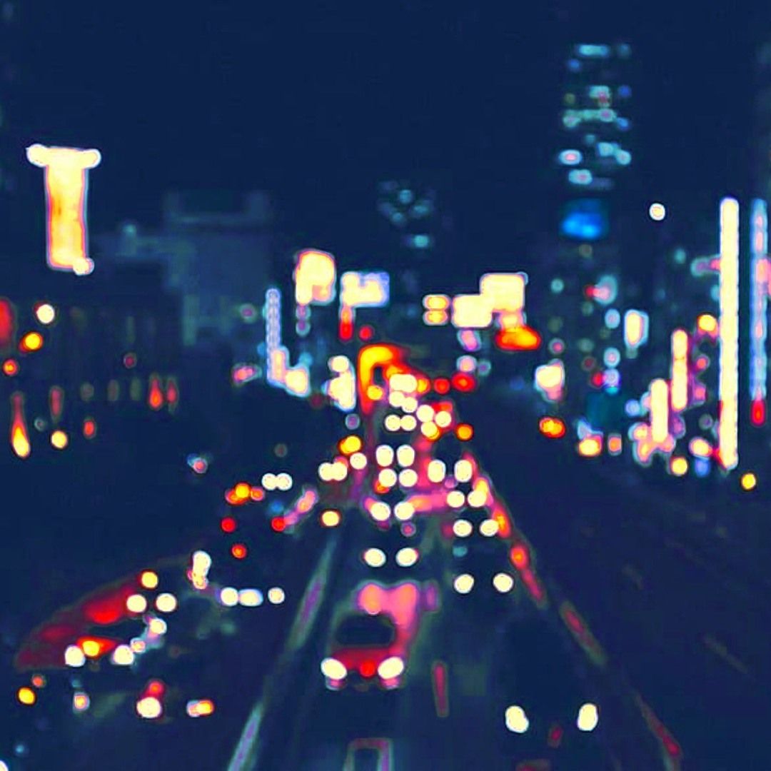 Cover of the track The Boulevard of Broken Circuits showing a tinted traffic scene.