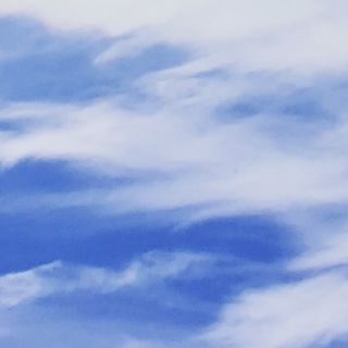 Cover of the track Nuages I showing a blue sky with clouds.